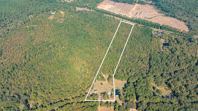 birds eye view of property with a rural view