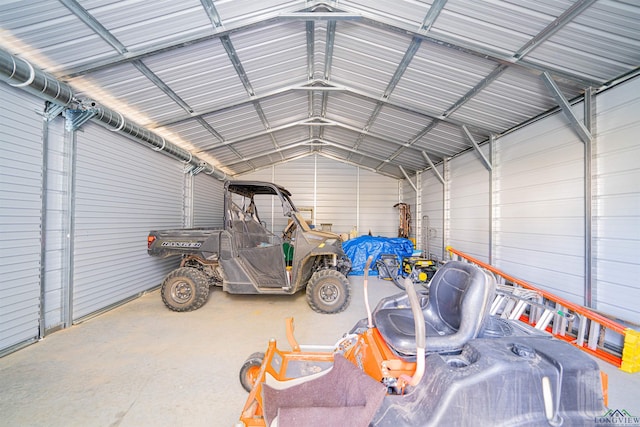 garage featuring a carport