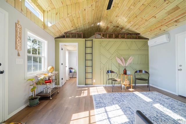 sitting room with hardwood / wood-style flooring, vaulted ceiling, wood ceiling, and a wall mounted AC