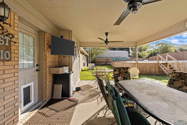 view of patio with ceiling fan