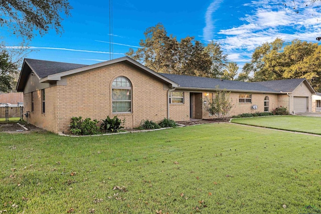 ranch-style home with a front yard