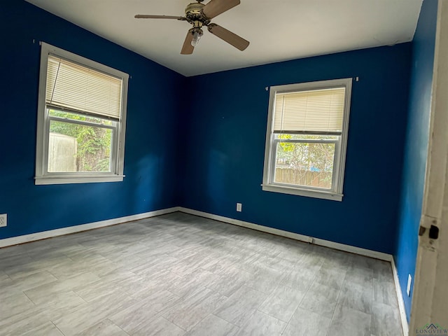 unfurnished room featuring ceiling fan