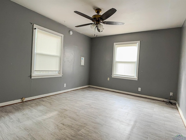 unfurnished room featuring ceiling fan