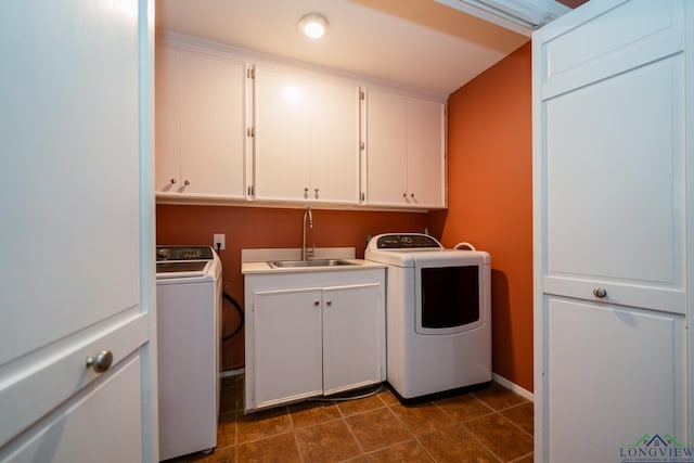 laundry area with sink and cabinets