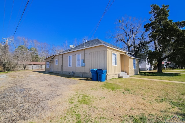 view of home's exterior featuring a lawn