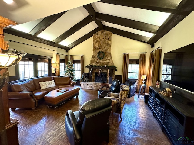 carpeted living room with beamed ceiling, high vaulted ceiling, and a fireplace