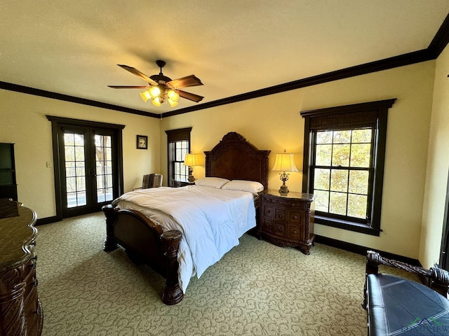 bedroom featuring ceiling fan, crown molding, light carpet, and french doors