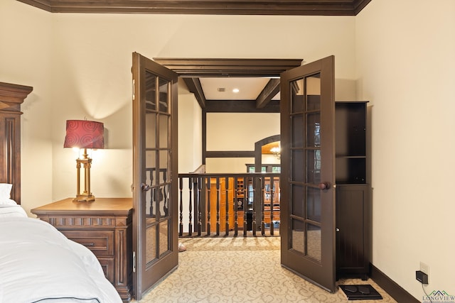 bedroom featuring french doors and ornamental molding