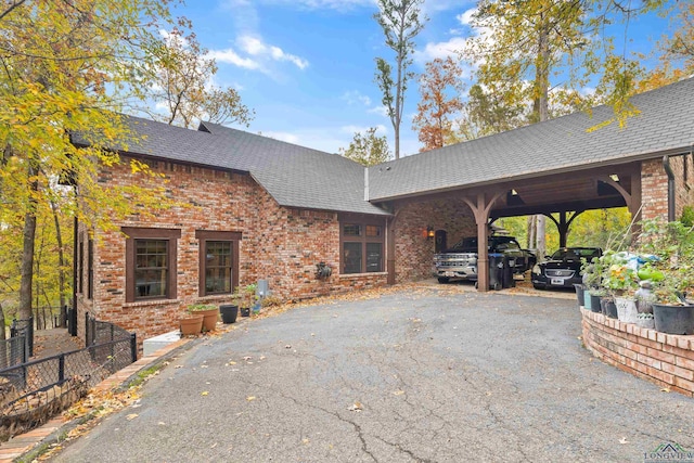 exterior space with a carport