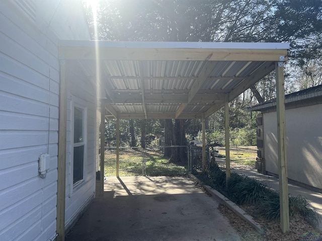 view of patio / terrace featuring a carport