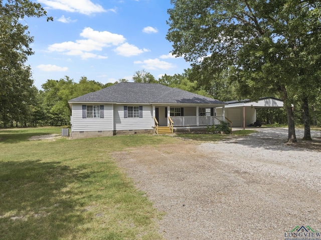 ranch-style house with a carport, a front yard, covered porch, and cooling unit