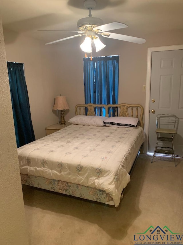 bedroom featuring carpet and ceiling fan