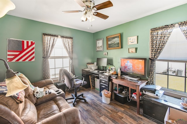 home office featuring ceiling fan and dark wood-type flooring