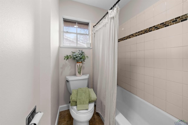 bathroom with toilet and shower / tub combo with curtain