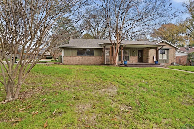 single story home featuring a front yard