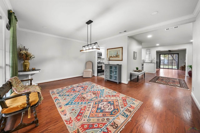 interior space featuring dark wood-type flooring and ornamental molding