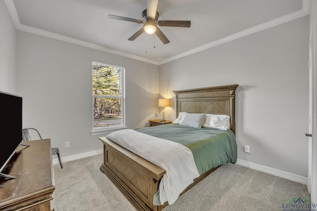 carpeted bedroom featuring ceiling fan and ornamental molding