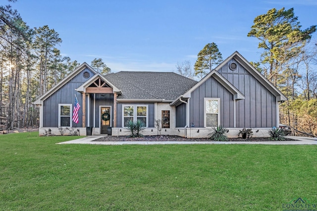 modern farmhouse with a front lawn