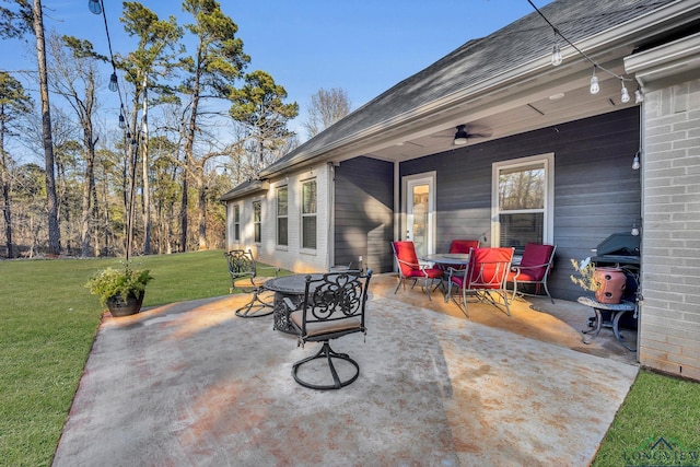 view of patio / terrace featuring ceiling fan