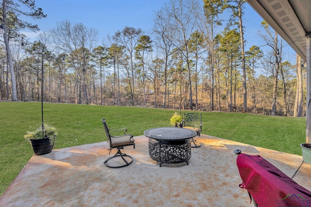 view of patio / terrace with a fire pit