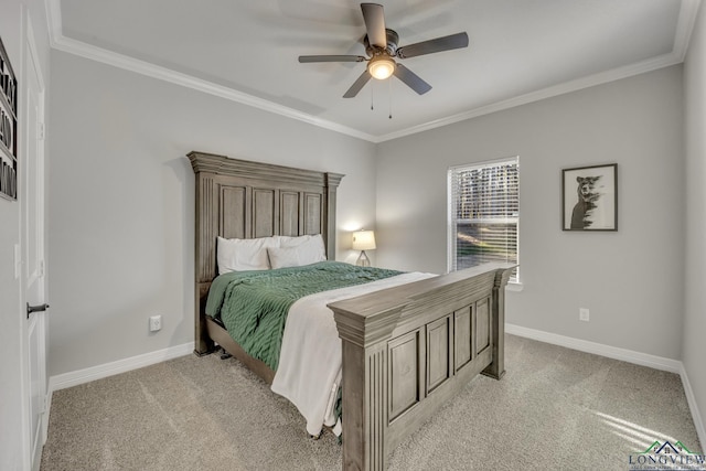 bedroom featuring ceiling fan, ornamental molding, and light carpet