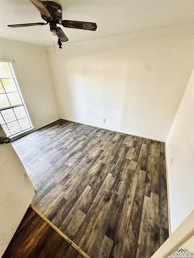 unfurnished room featuring hardwood / wood-style flooring and ceiling fan