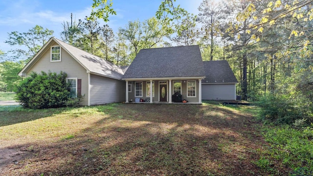 128 Inwood Rd, Texarkana, TX 75501 - view of front of house featuring a porch and a front lawn