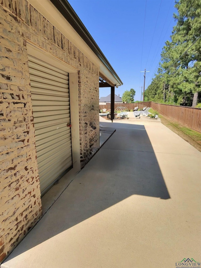 view of patio with fence