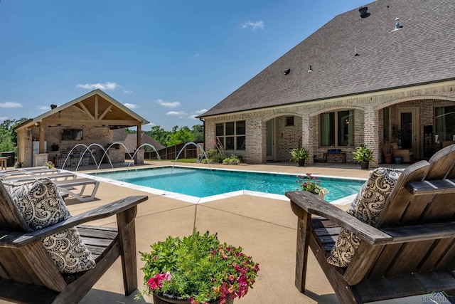 outdoor pool with a patio