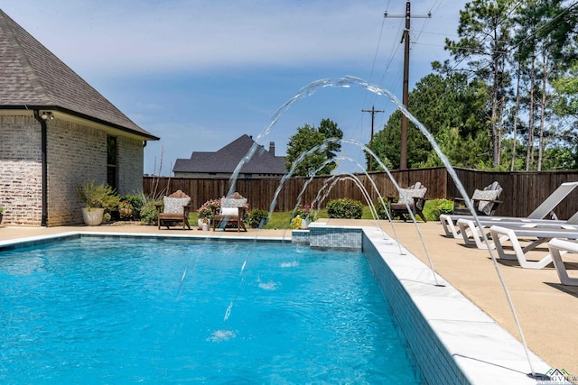 view of pool featuring a fenced in pool, a fenced backyard, and a patio area