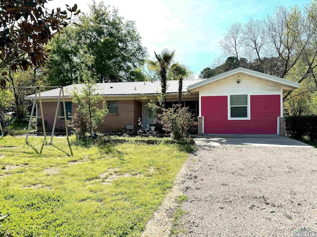 ranch-style house with a front yard