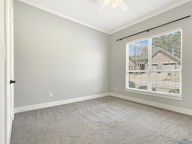 7323 Lake Pointe Cv, Tyler, TX 75703 - empty room with crown molding, baseboards, ceiling fan, and carpet