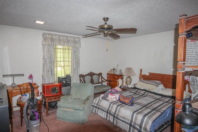 1006 Quitman St, Pittsburg, TX 75686 - carpeted bedroom with a textured ceiling and ceiling fan