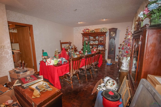 1006 Quitman St, Pittsburg, TX 75686 - dining space featuring a textured ceiling