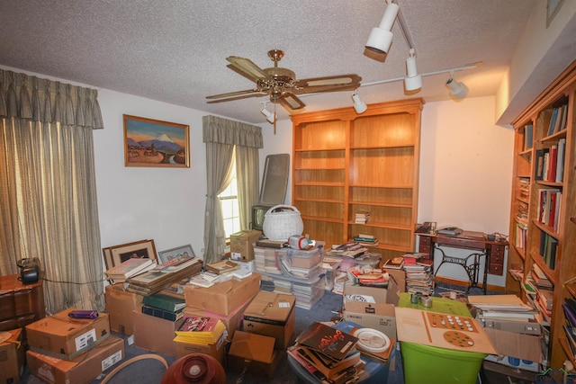 1006 Quitman St, Pittsburg, TX 75686 - office featuring a ceiling fan, a textured ceiling, and rail lighting