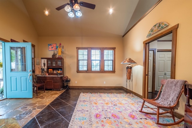 interior space with ceiling fan and high vaulted ceiling