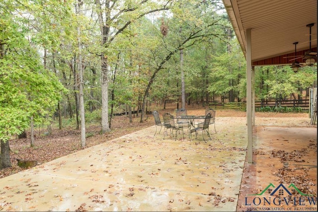 view of patio featuring ceiling fan