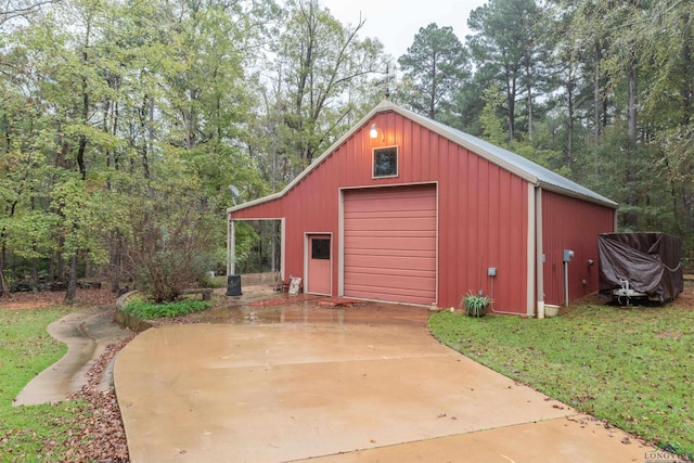 view of outdoor structure featuring a garage