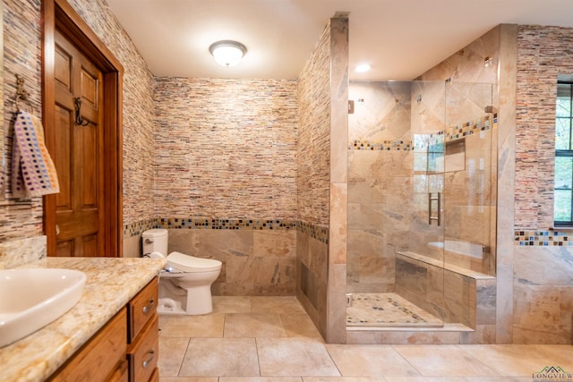 bathroom featuring vanity, toilet, and walk in shower