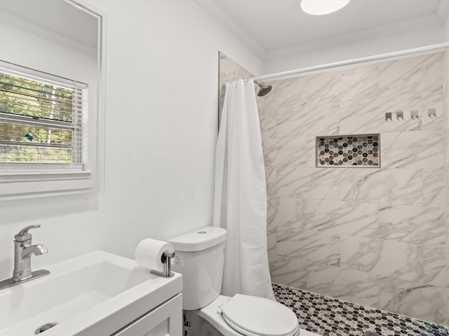 bathroom with toilet, crown molding, and walk in shower