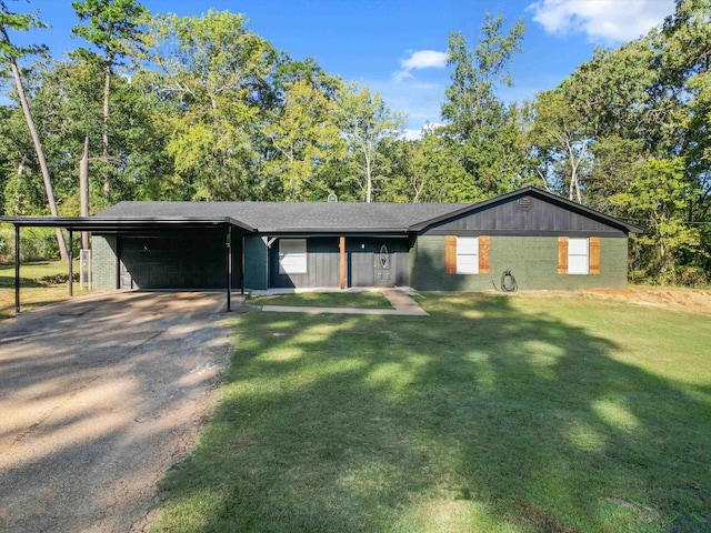 single story home with a front lawn and a carport