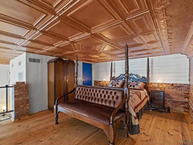 bedroom with light hardwood / wood-style floors