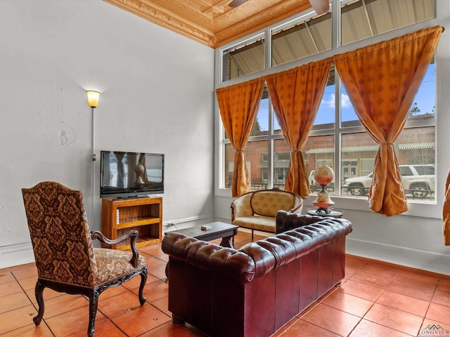 living room with tile patterned floors