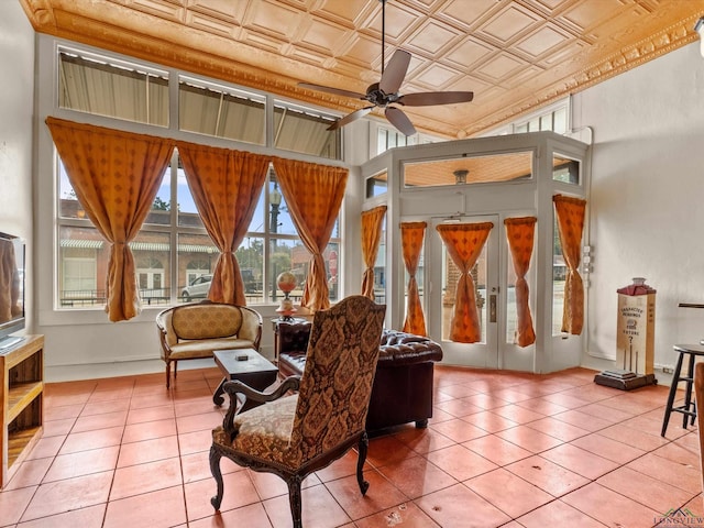 sunroom / solarium with ceiling fan