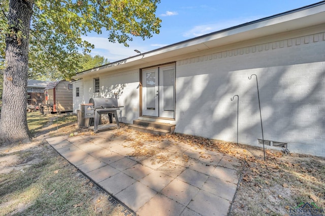 back of house featuring a patio