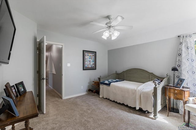 bedroom with ceiling fan and carpet floors