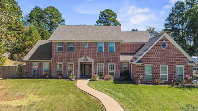 view of front of home featuring a front lawn