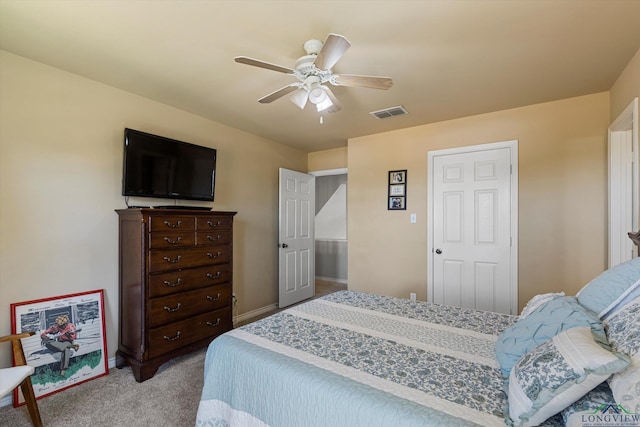 bedroom featuring ceiling fan and light colored carpet