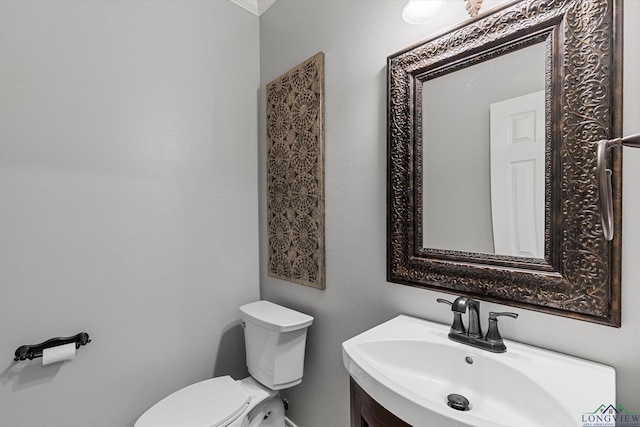 bathroom with toilet and sink