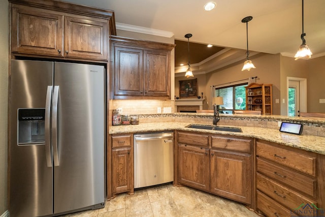 2106 Katie Lee Ln, Longview, TX 75601 - kitchen featuring appliances with stainless steel finishes, a sink, ornamental molding, backsplash, and light stone counters
